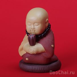 Фигурка "Монах с лотосом", глина-